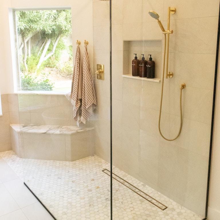 white bathtub with shower curtain