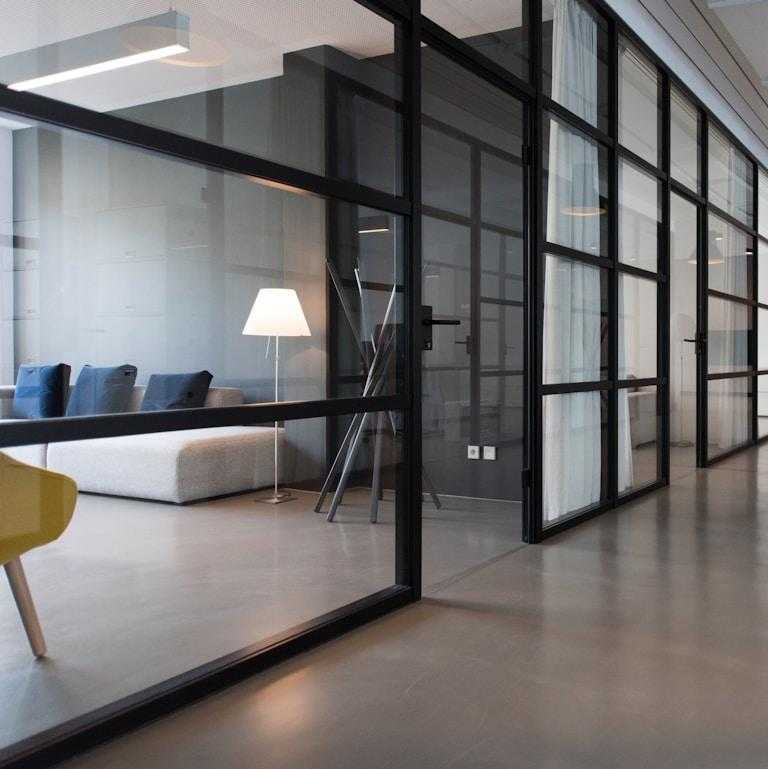 hallway between glass-panel doors